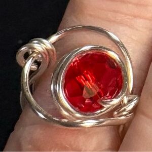 Elegant Silver Ring with Vibrant Red Gem